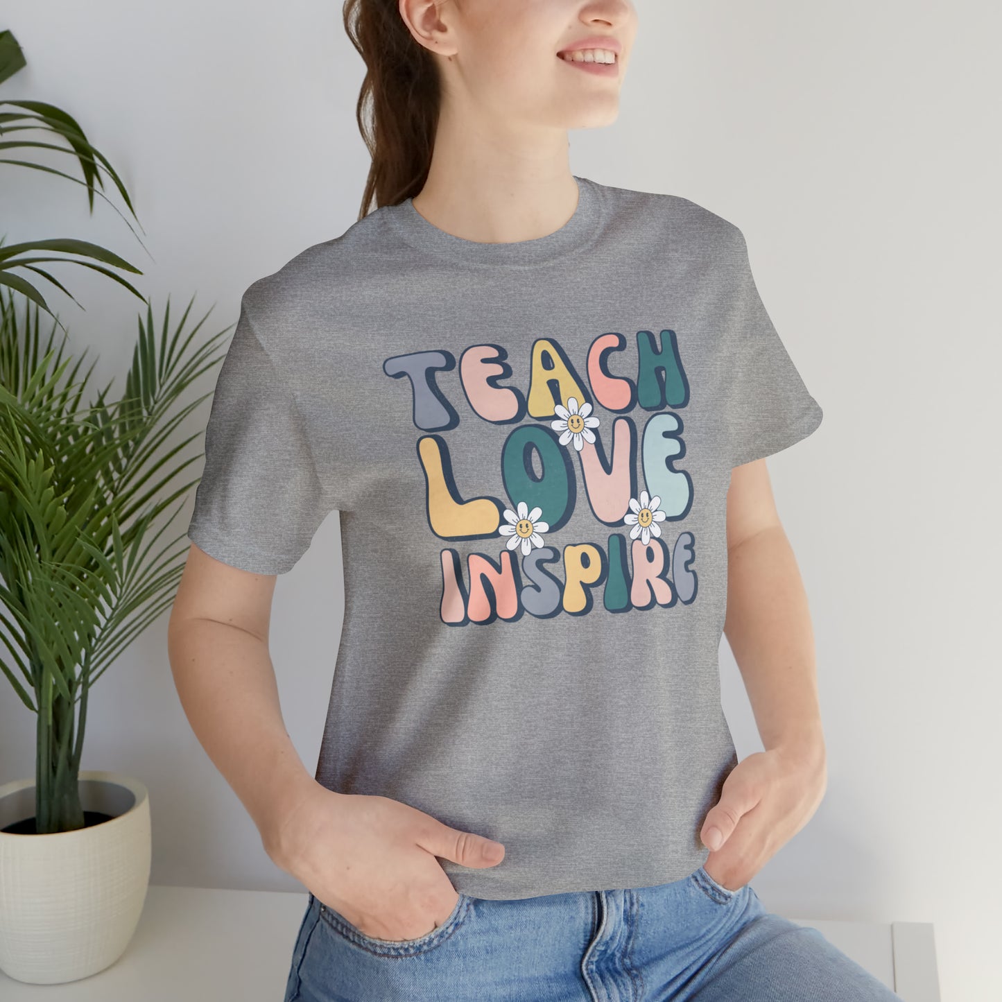 Teach Love Inspire Unisex Jersey Short Sleeve Tee