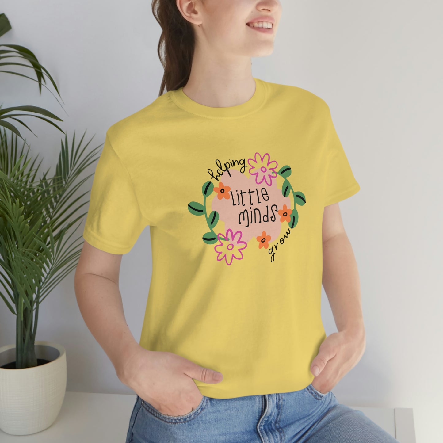 Helping Little Minds Grow Unisex Jersey Short Sleeve Tee