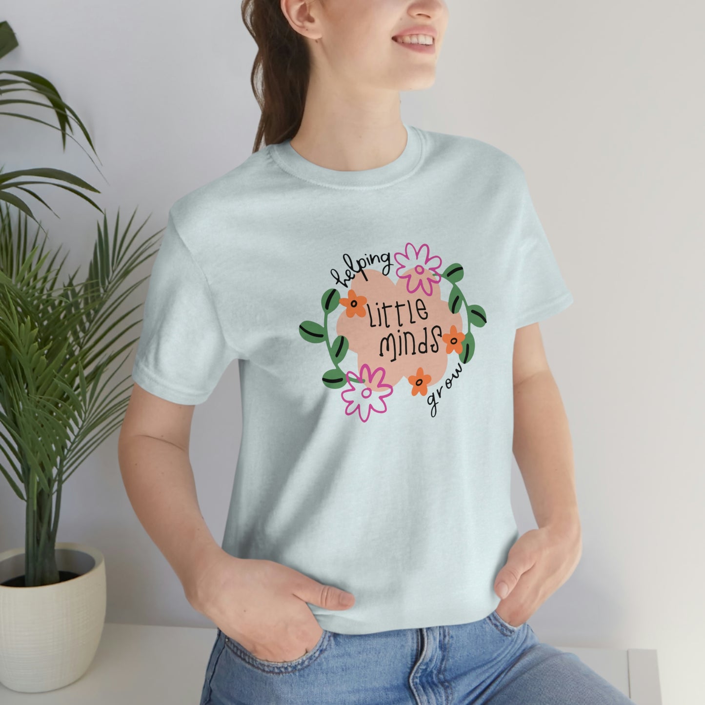 Helping Little Minds Grow Unisex Jersey Short Sleeve Tee