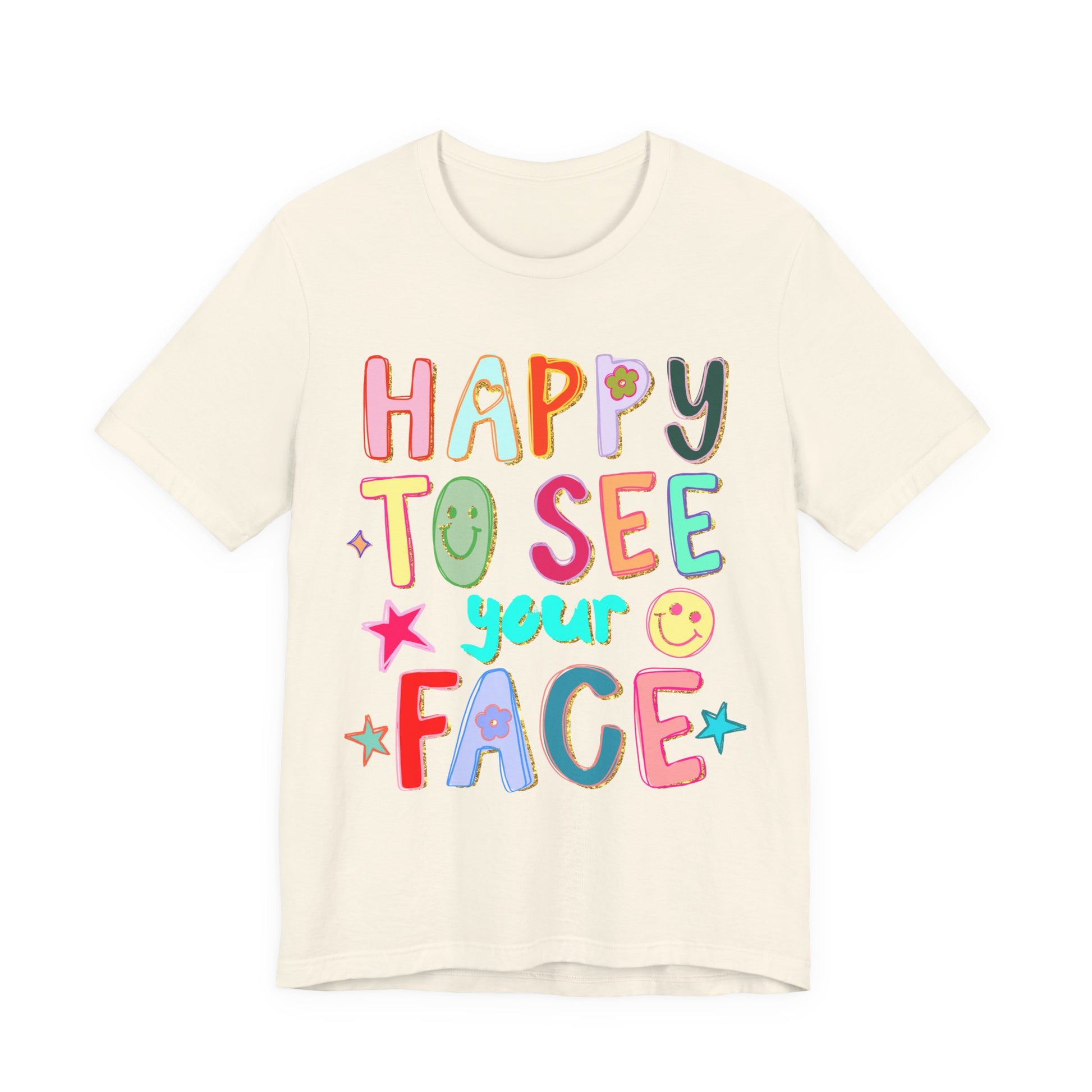 Beige t-shirt with colorful text 'Happy to see your face' on a white background